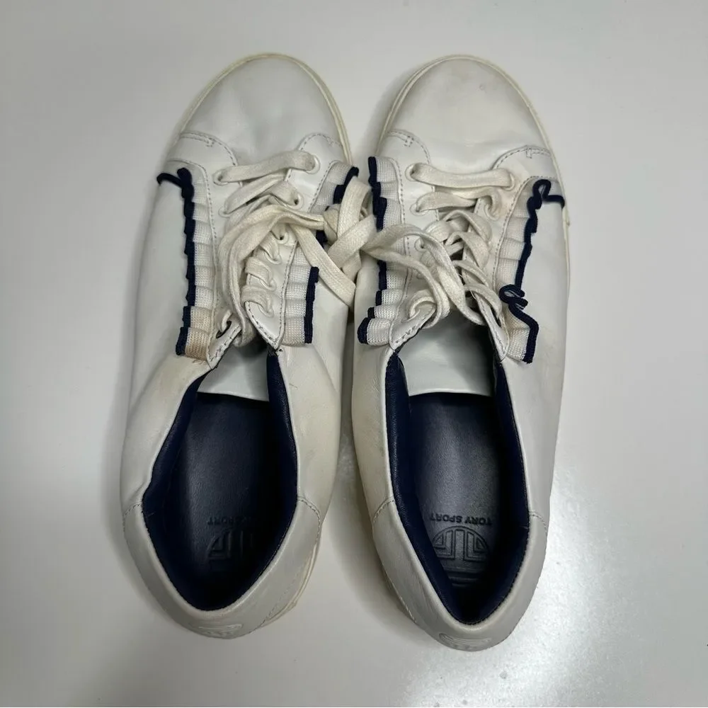 Tory Burch Ruffle sneakers. Size 10M. White with elegant‎ black ruffle.